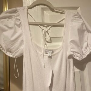 And now this white puff sleeves above knee size small new with tag